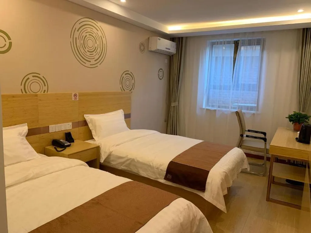 Bed in Shell Hotel Beijing Fangshan District Chengguan Metro Station