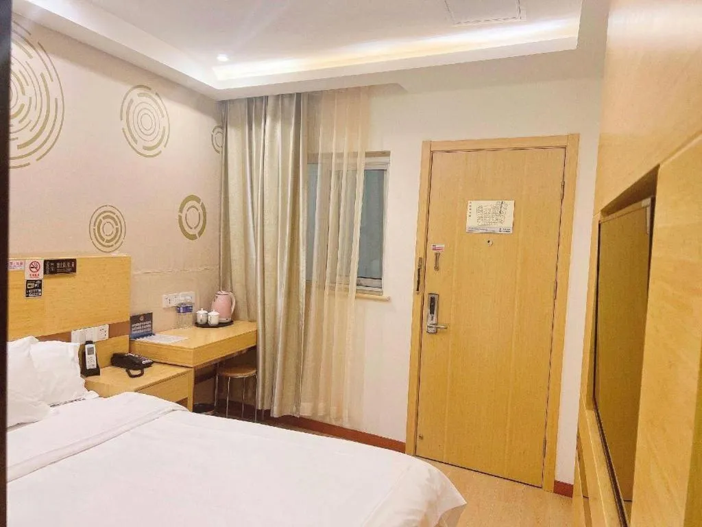 Bed in Shell Hotel Beijing Fangshan District Chengguan Metro Station