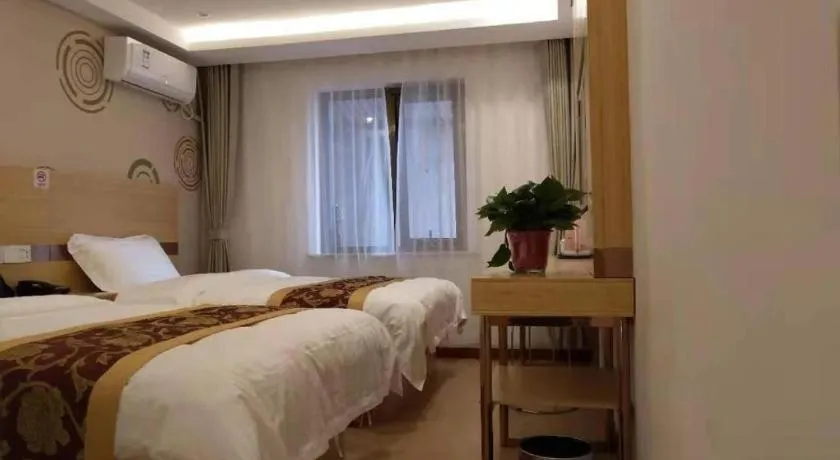 Bed in Shell Hotel Beijing Fangshan District Chengguan Metro Station