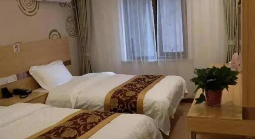 Bed in Shell Hotel Beijing Fangshan District Chengguan Metro Station