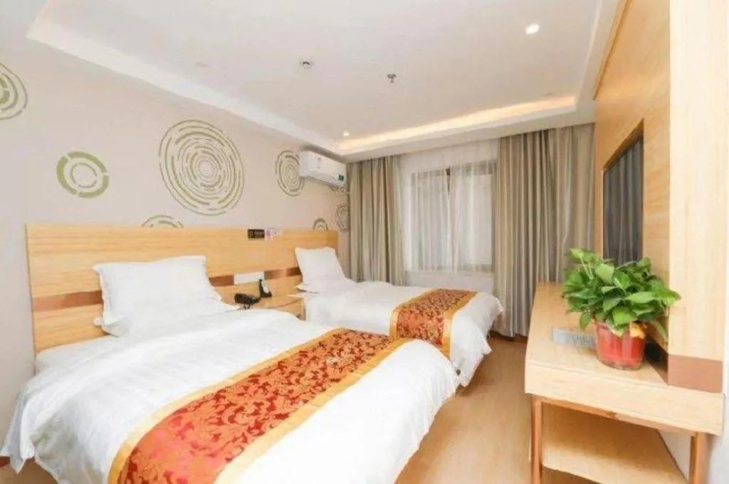 Bed in Shell Hotel Beijing Fangshan District Chengguan Metro Station