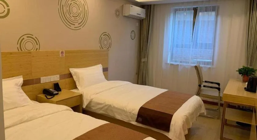 Bed in Shell Hotel Beijing Fangshan District Chengguan Metro Station