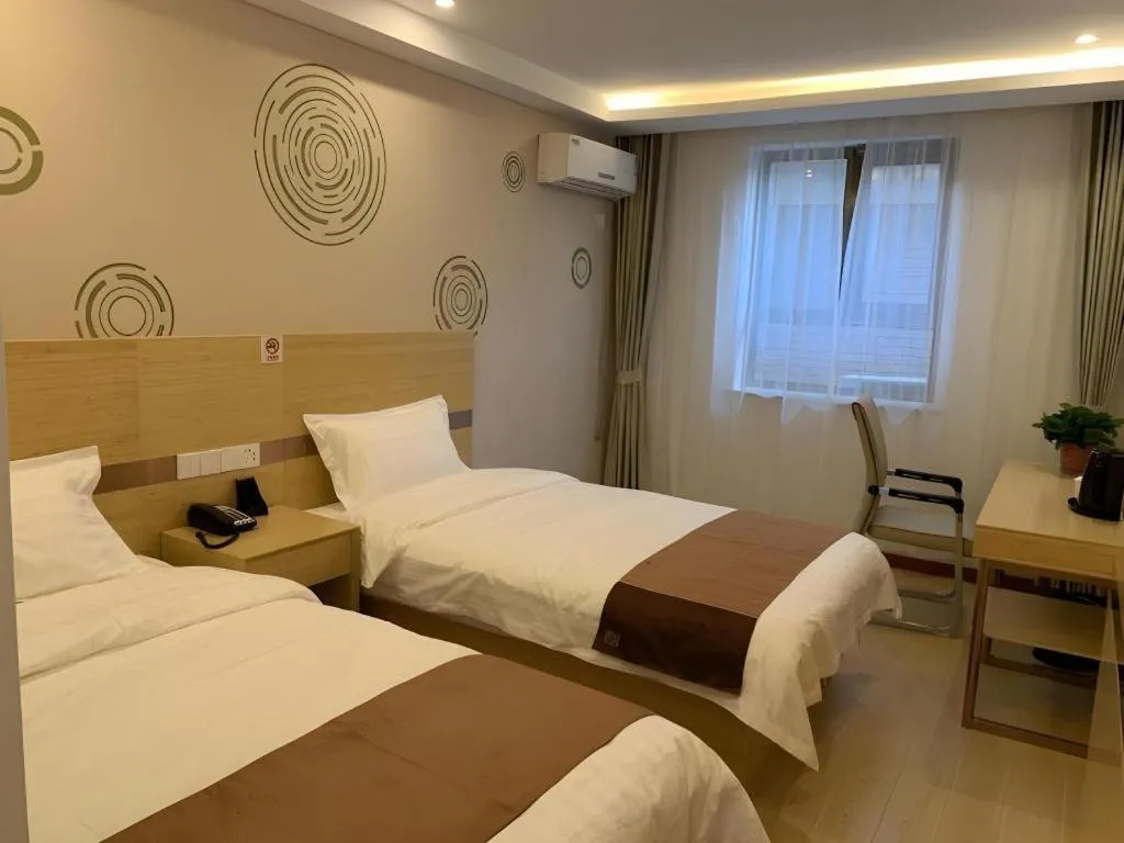 Bed in Shell Hotel Beijing Fangshan District Chengguan Metro Station