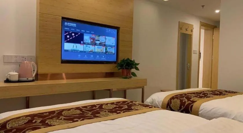 Bed in Shell Hotel Beijing Fangshan District Chengguan Metro Station