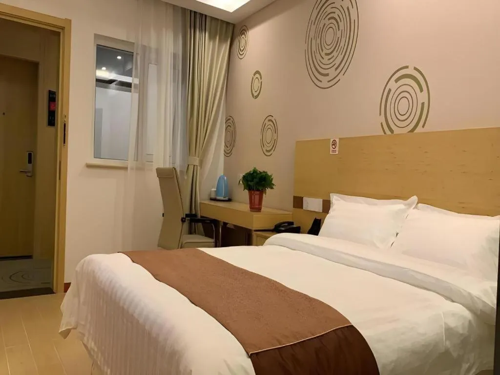 Bed in Shell Hotel Beijing Fangshan District Chengguan Metro Station