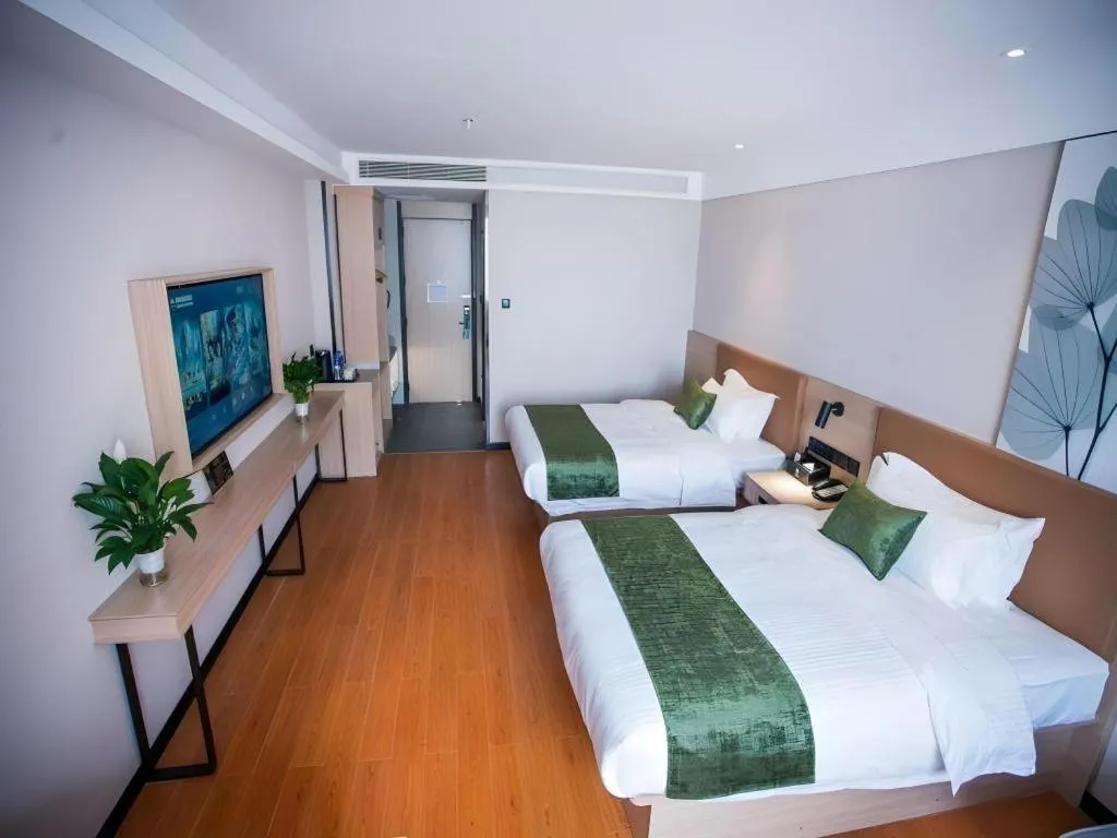 Bed in GreenTree Inn Tangshan Nanhu International Exhibition Center