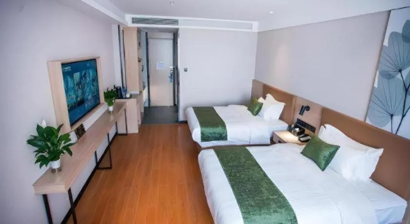 Bed in GreenTree Inn Tangshan Nanhu International Exhibition Center