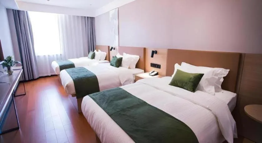 Bed in GreenTree Inn Tangshan Nanhu International Exhibition Center