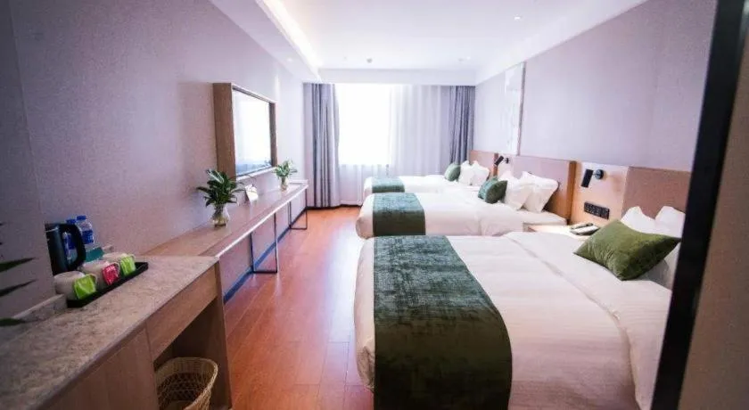 Bed in GreenTree Inn Tangshan Nanhu International Exhibition Center