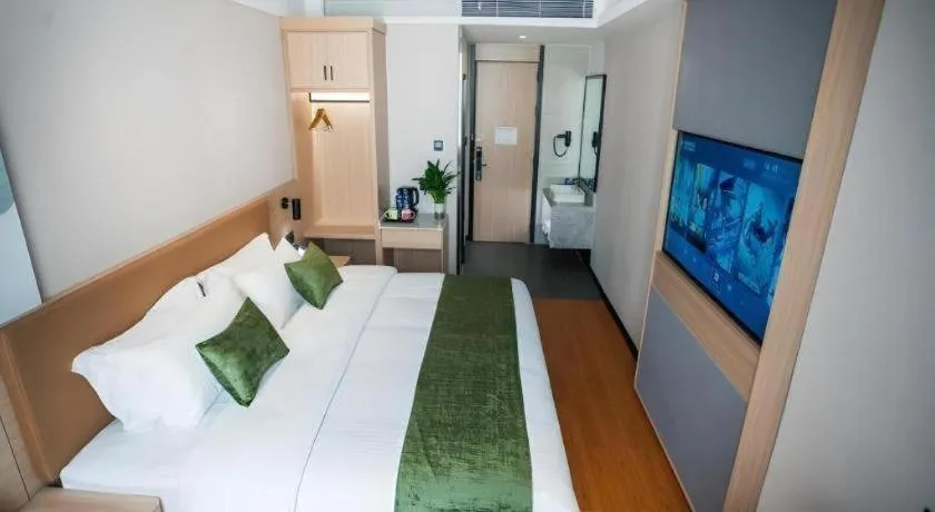 Bed in GreenTree Inn Tangshan Nanhu International Exhibition Center