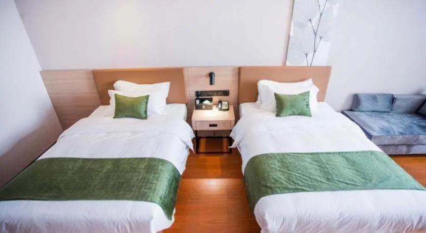 Bed in GreenTree Inn Tangshan Nanhu International Exhibition Center