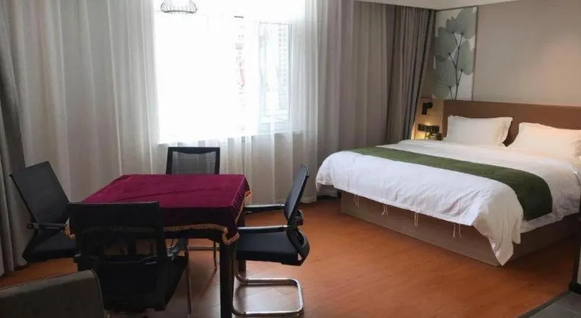 Bed in GreenTree Inn Tangshan Nanhu International Exhibition Center