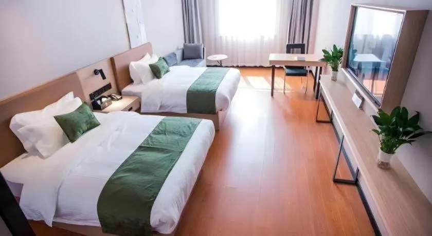 Bed in GreenTree Inn Tangshan Nanhu International Exhibition Center