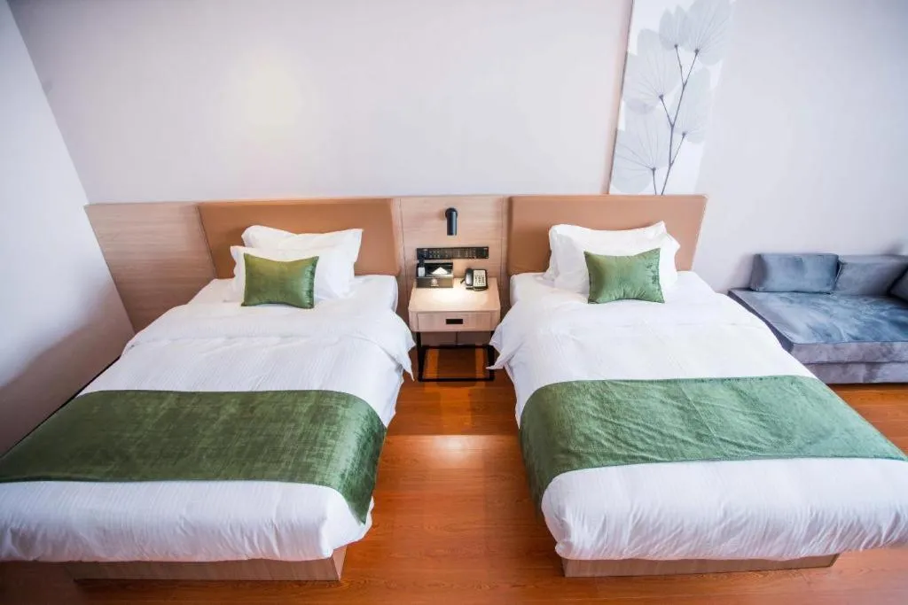 Bed in GreenTree Inn Tangshan Nanhu International Exhibition Center