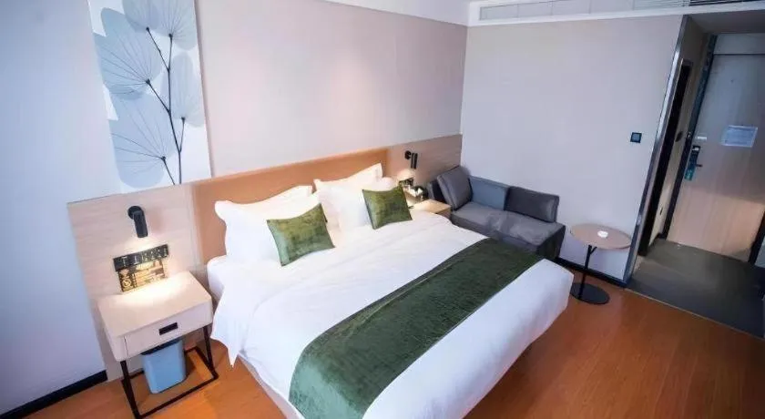 Bed in GreenTree Inn Tangshan Nanhu International Exhibition Center