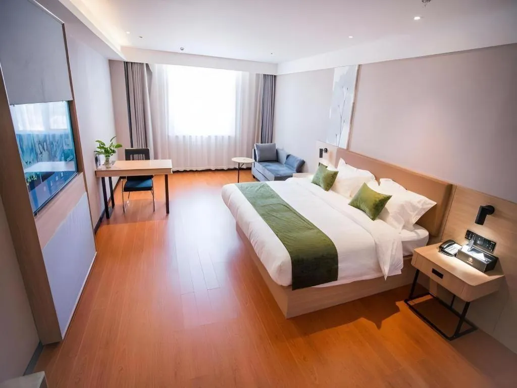 Bed in GreenTree Inn Tangshan Nanhu International Exhibition Center