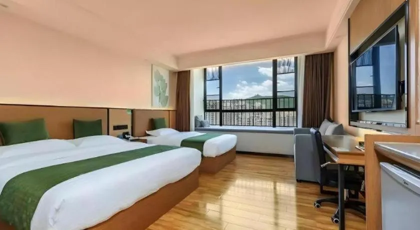 Bed in GreenTree Inn Tangshan Nanhu International Exhibition Center