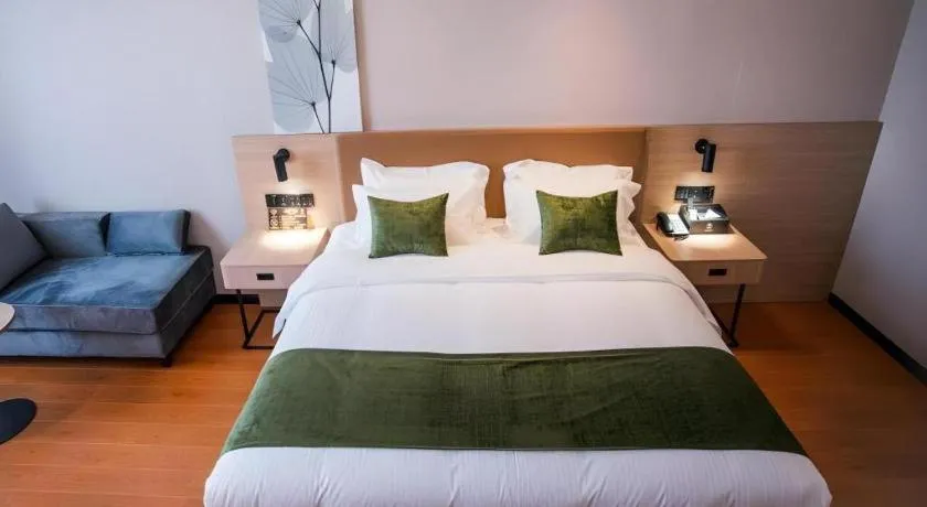 Bed in GreenTree Inn Tangshan Nanhu International Exhibition Center