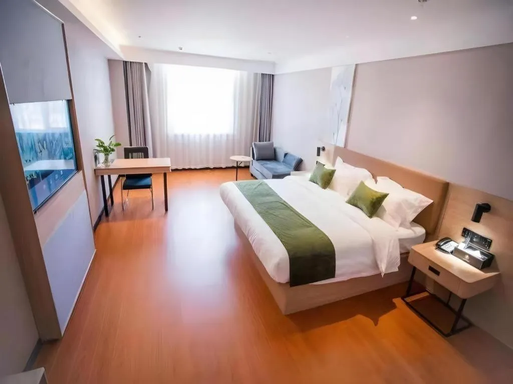 Bed in GreenTree Inn Tangshan Nanhu International Exhibition Center