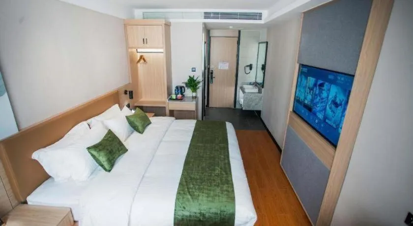 Bed in GreenTree Inn Tangshan Nanhu International Exhibition Center