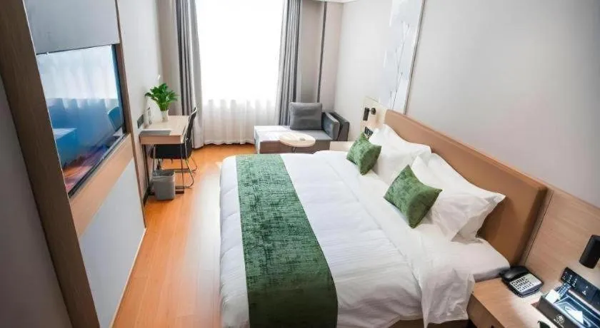 Bed in GreenTree Inn Tangshan Nanhu International Exhibition Center