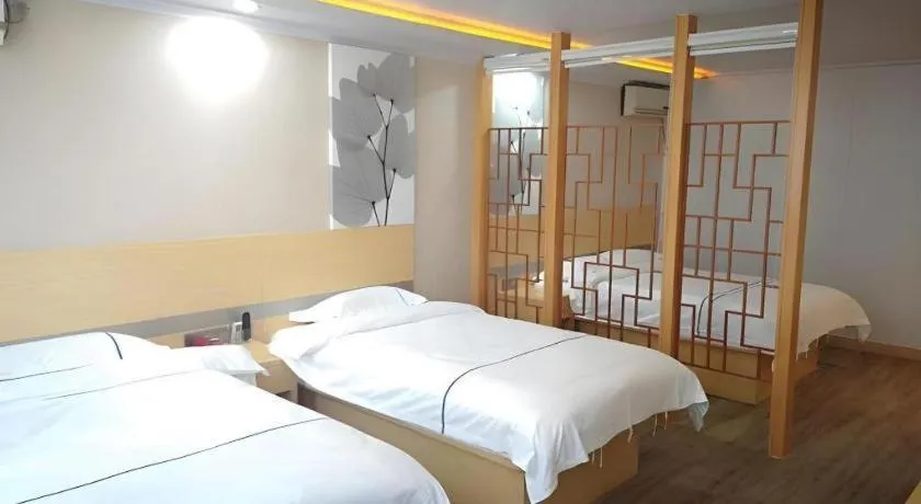 Bed in GreenTree Inn Express Shanghai Baoshan District Youyi Road Metro Station