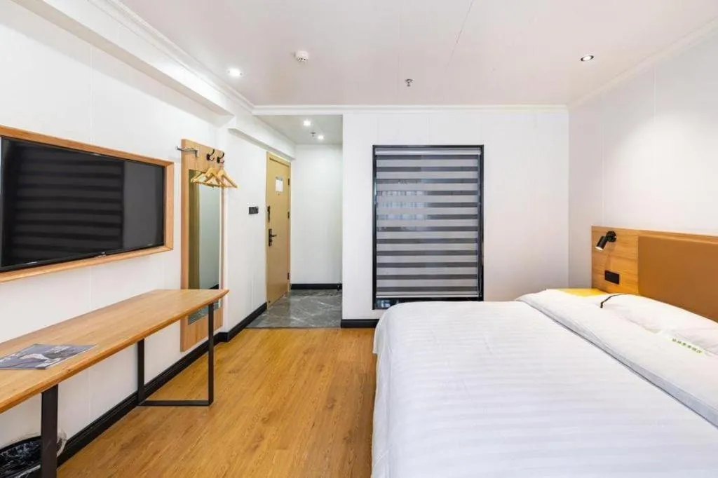 Bed in GreenTree Inn Express Shanghai Baoshan District Youyi Road Metro Station