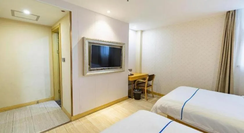 Bed in GreenTree Inn Express Shanghai Baoshan District Youyi Road Metro Station