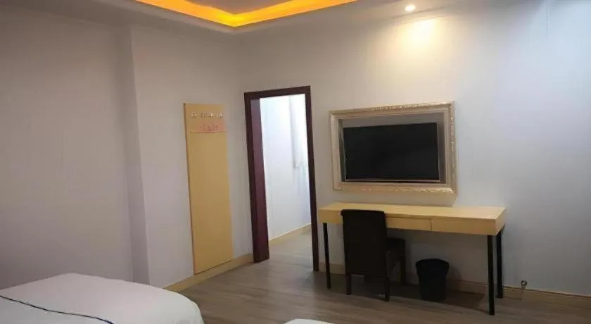 Bed in GreenTree Inn Express Shanghai Baoshan District Youyi Road Metro Station