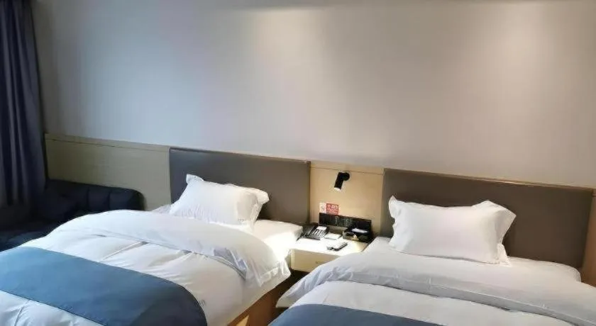 Bed in Shell Hotel Chuzhou Economic Development Zone Internation Shangcheng