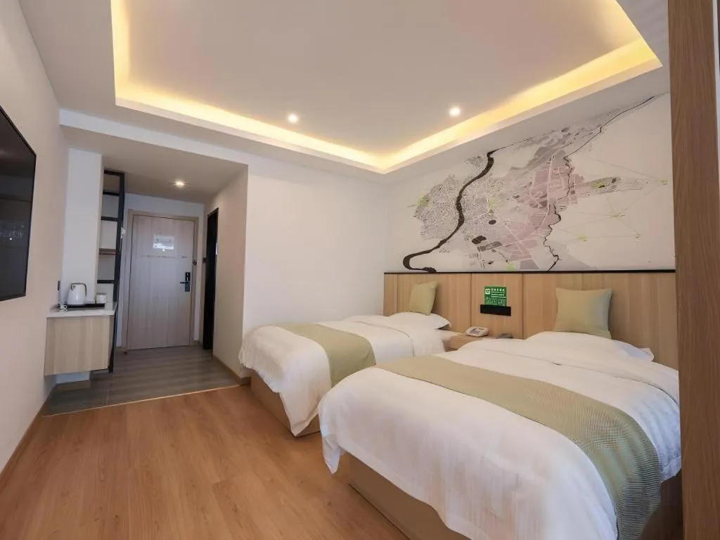 Bed in Vatica Hotel Huangshan South Gate Terminal Station