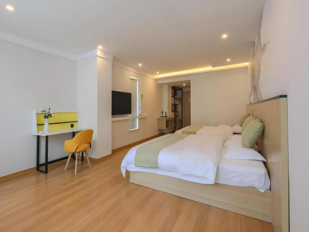 Bed in Vatica Hotel Huangshan South Gate Terminal Station