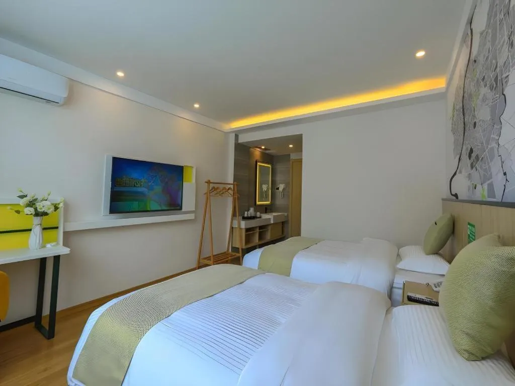 Bed in Vatica Hotel Huangshan South Gate Terminal Station