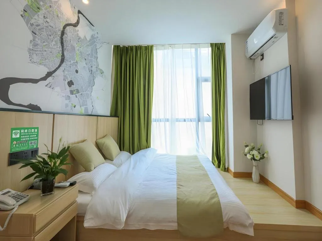 Bed in Vatica Hotel Huangshan South Gate Terminal Station