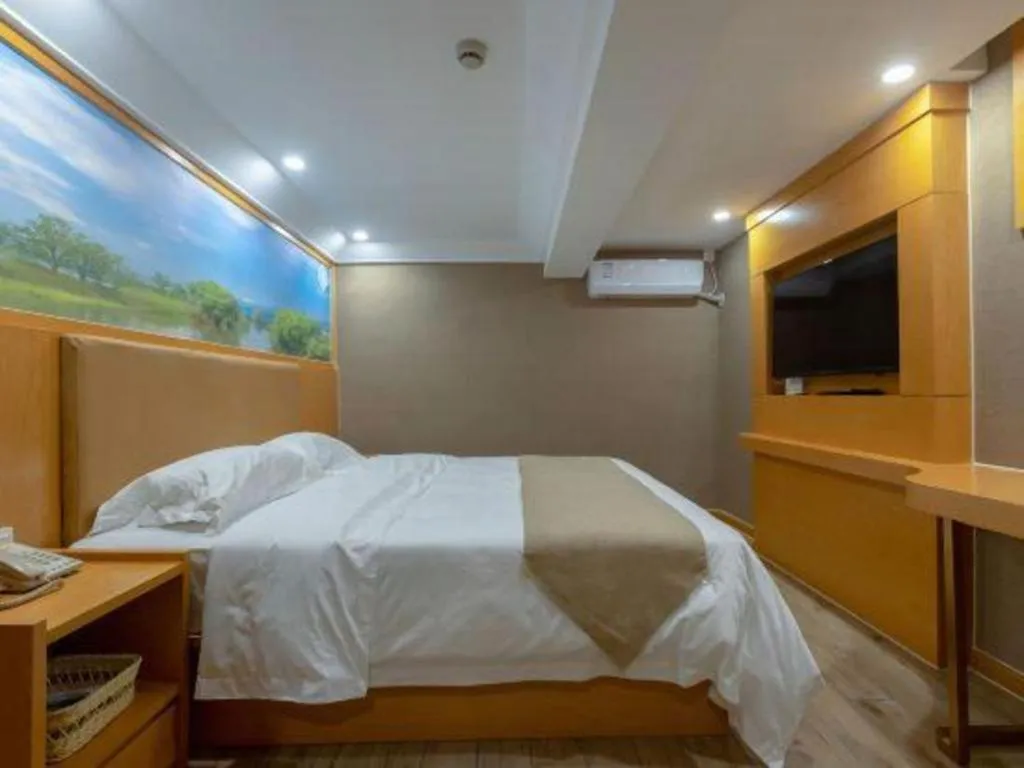 Bed in Shell Hotel Changzhou North Railway Station Global Harbor Metro Station
