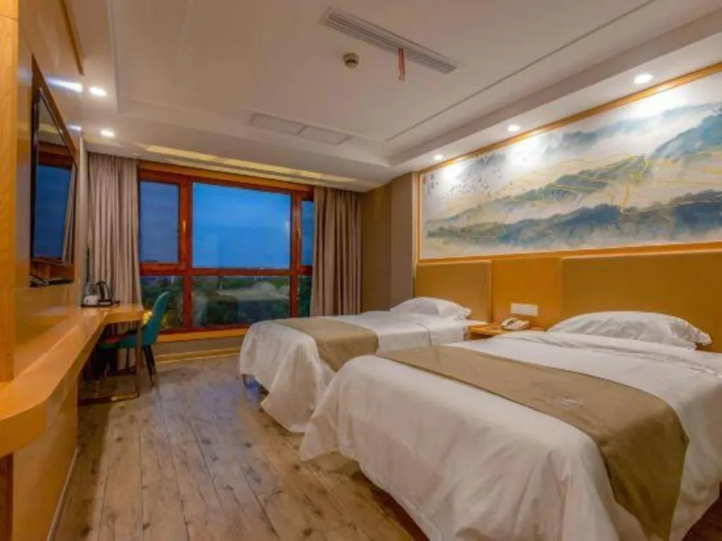 Bed in Shell Hotel Changzhou North Railway Station Global Harbor Metro Station