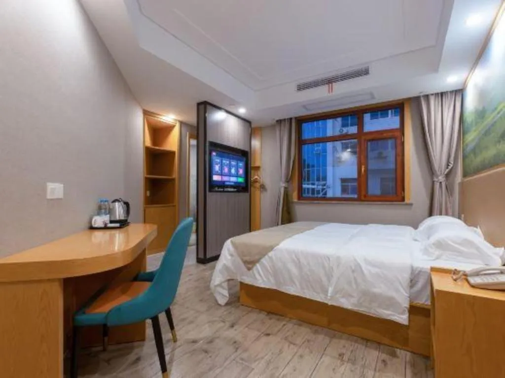 Bed in Shell Hotel Changzhou North Railway Station Global Harbor Metro Station