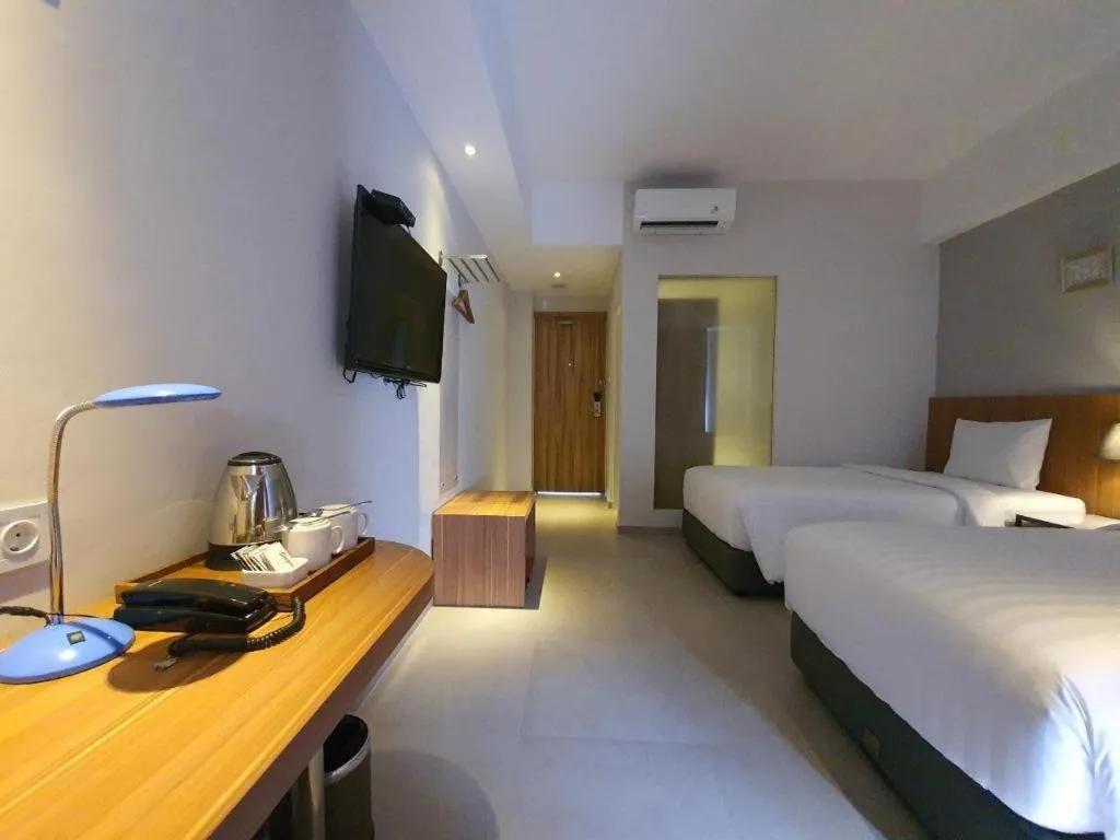 Bed in Hart Hotel Premium Rapatmaja