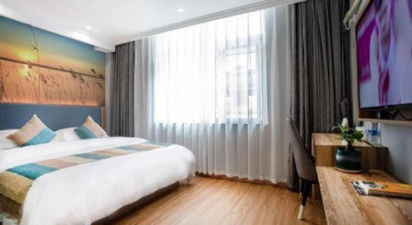 Bed in VX Hotel Hangzhou Banshan