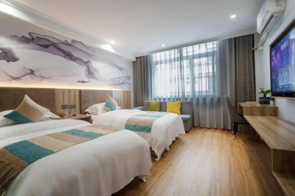 Bed in VX Hotel Hangzhou Banshan