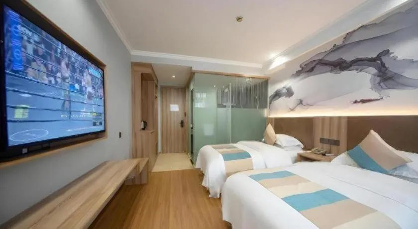 Bed in VX Hotel Hangzhou Banshan