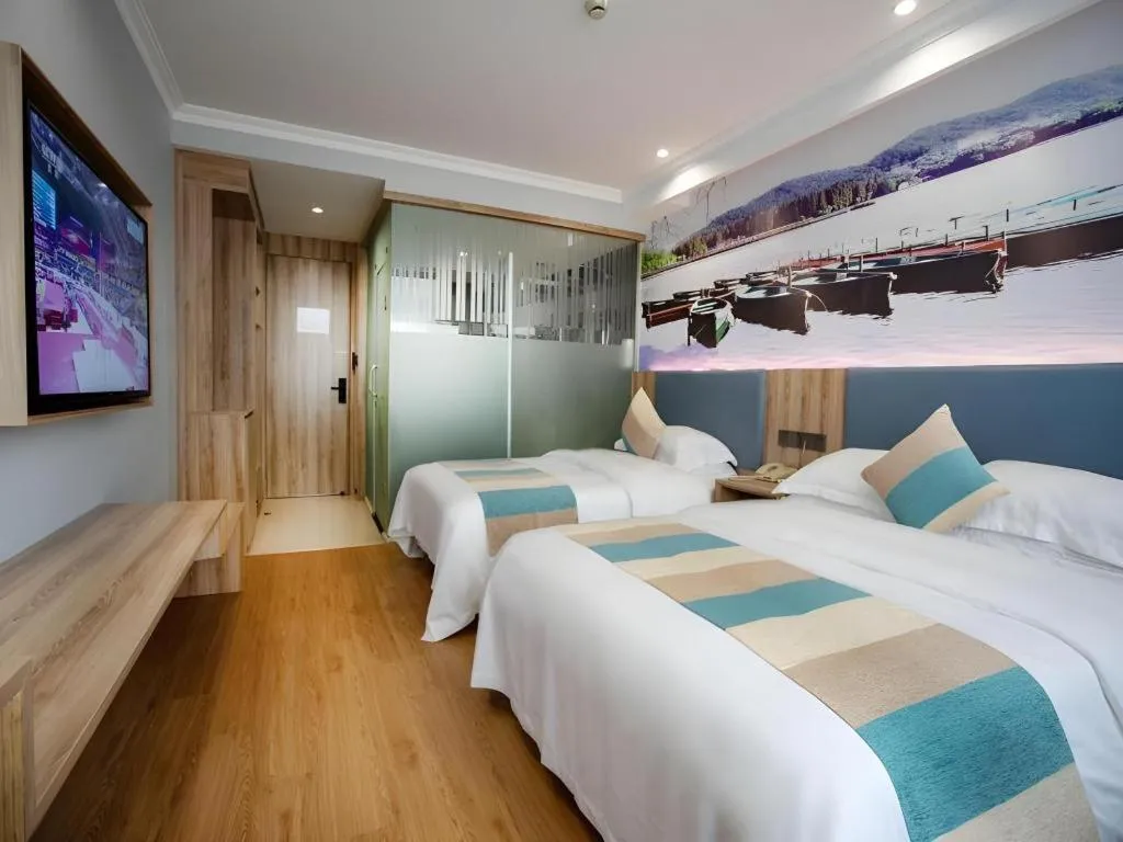 Bed in VX Hotel Hangzhou Banshan