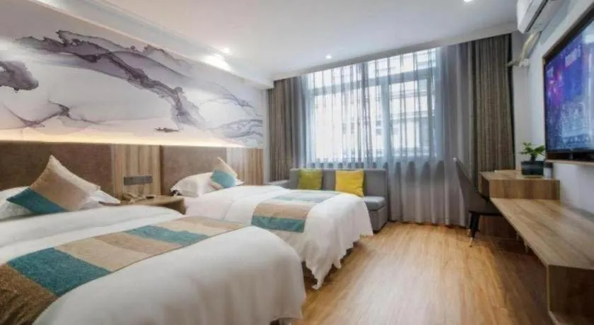 Bed in VX Hotel Hangzhou Banshan