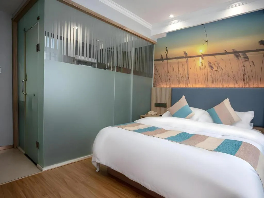 Bed in VX Hotel Hangzhou Banshan