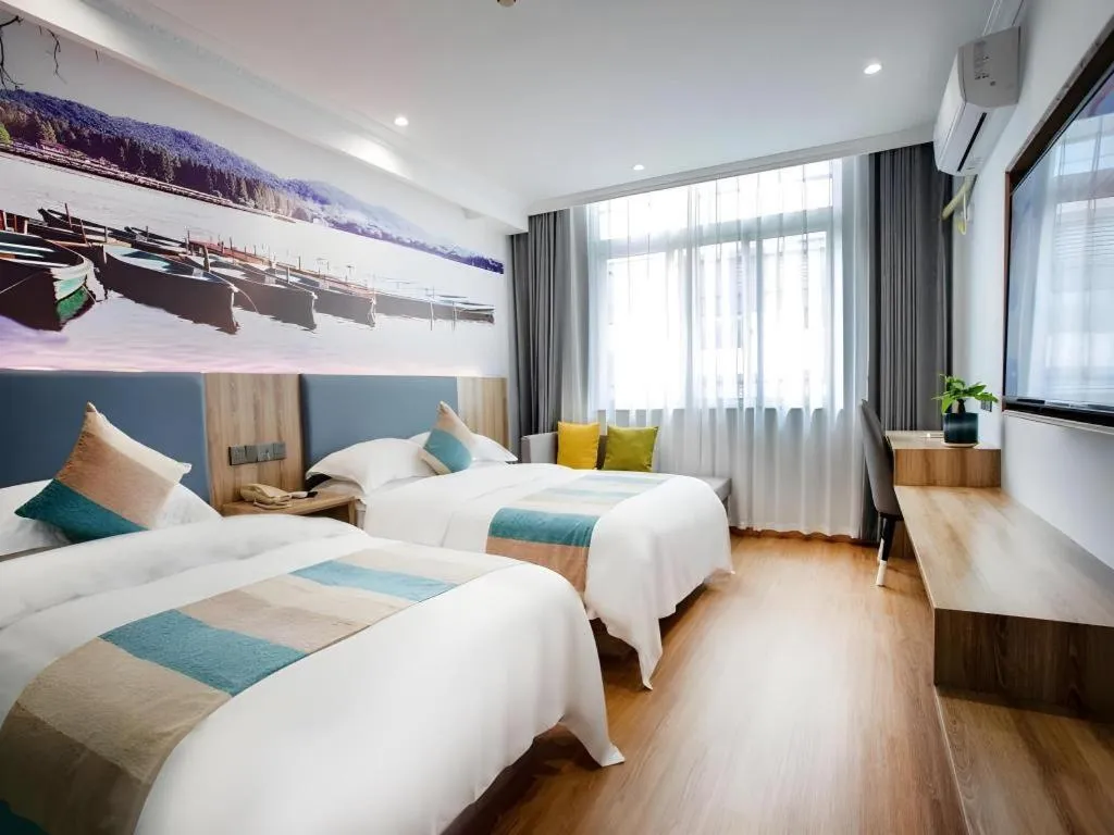 Bed in VX Hotel Hangzhou Banshan