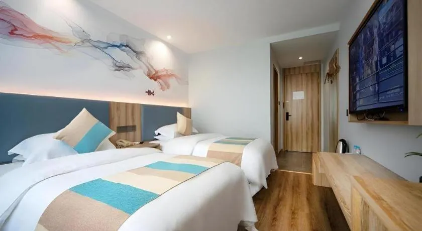 Bed in VX Hotel Hangzhou Banshan