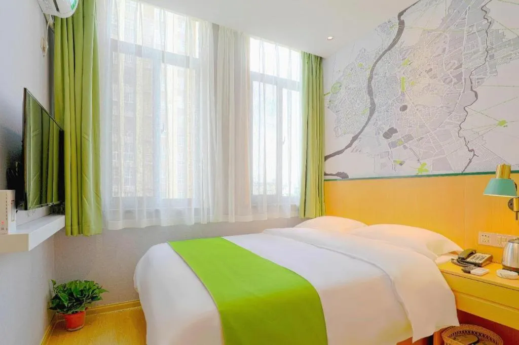 Bed in Vatica Hotel Hefei Yaohai Longgang Subway Station