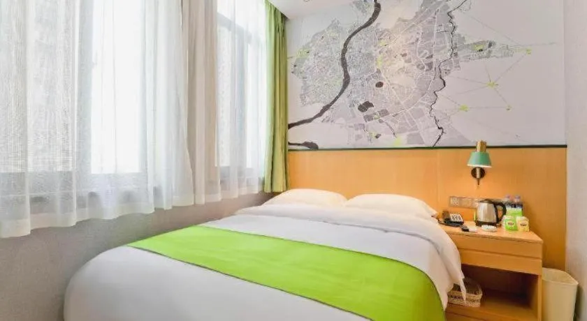 Bed in Vatica Hotel Hefei Yaohai Longgang Subway Station