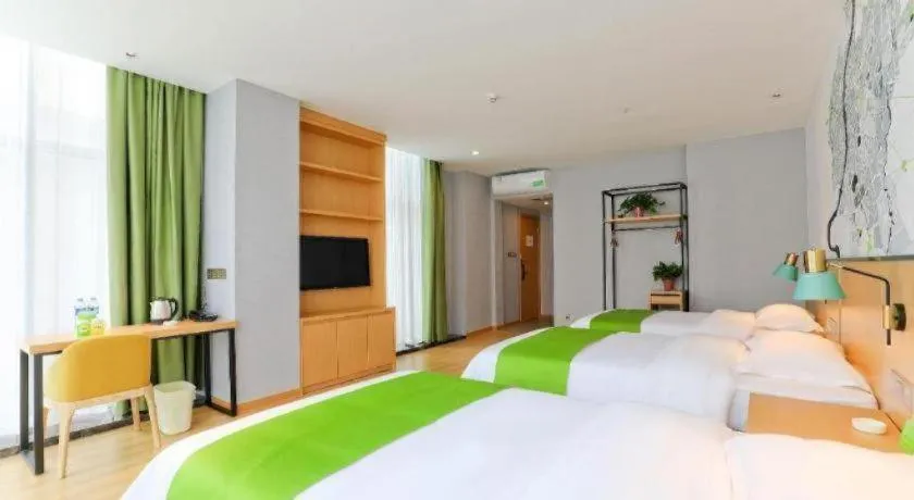 Bed in Vatica Hotel Hefei Yaohai Longgang Subway Station