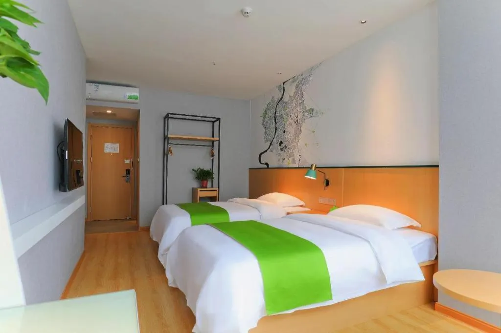 Bed in Vatica Hotel Hefei Yaohai Longgang Subway Station